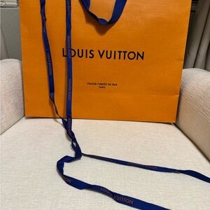 Louis Vuitton Bold Orange Bag with Blue Handles